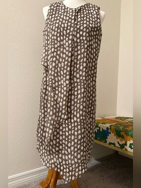 Michael Kors brown with white dots ruffle detail dress.